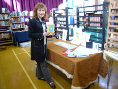 Dr Irina holding her eating disorders book
